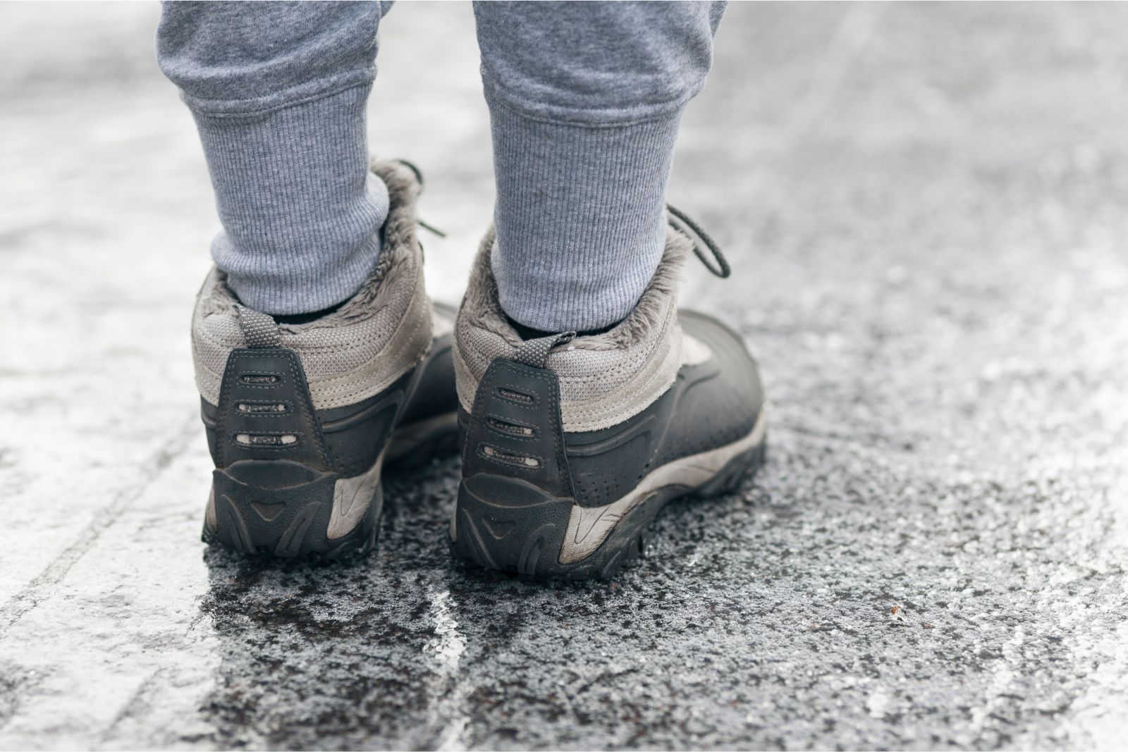 Boots standing flat footed on ice