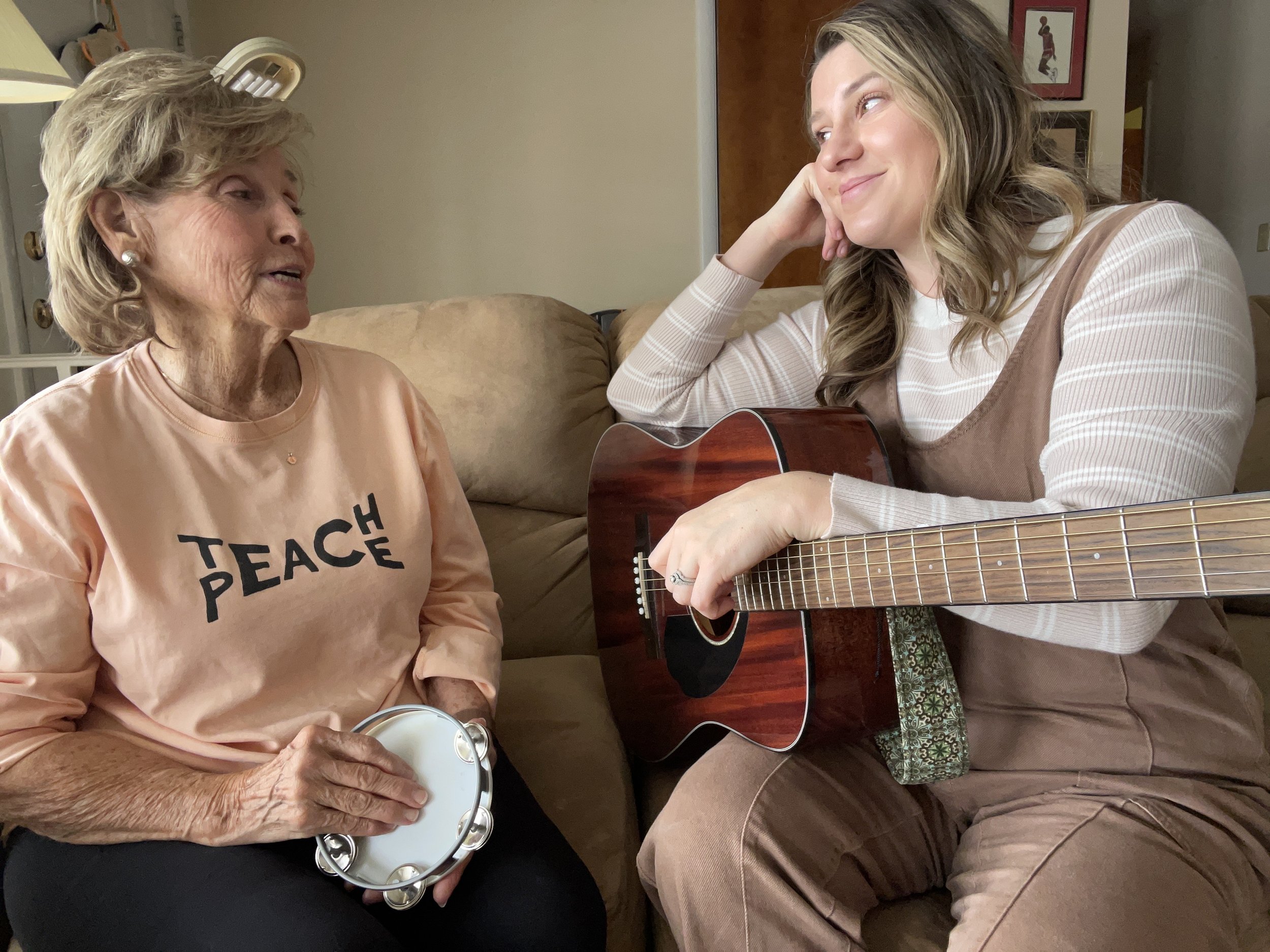 musical therapist with senior woman