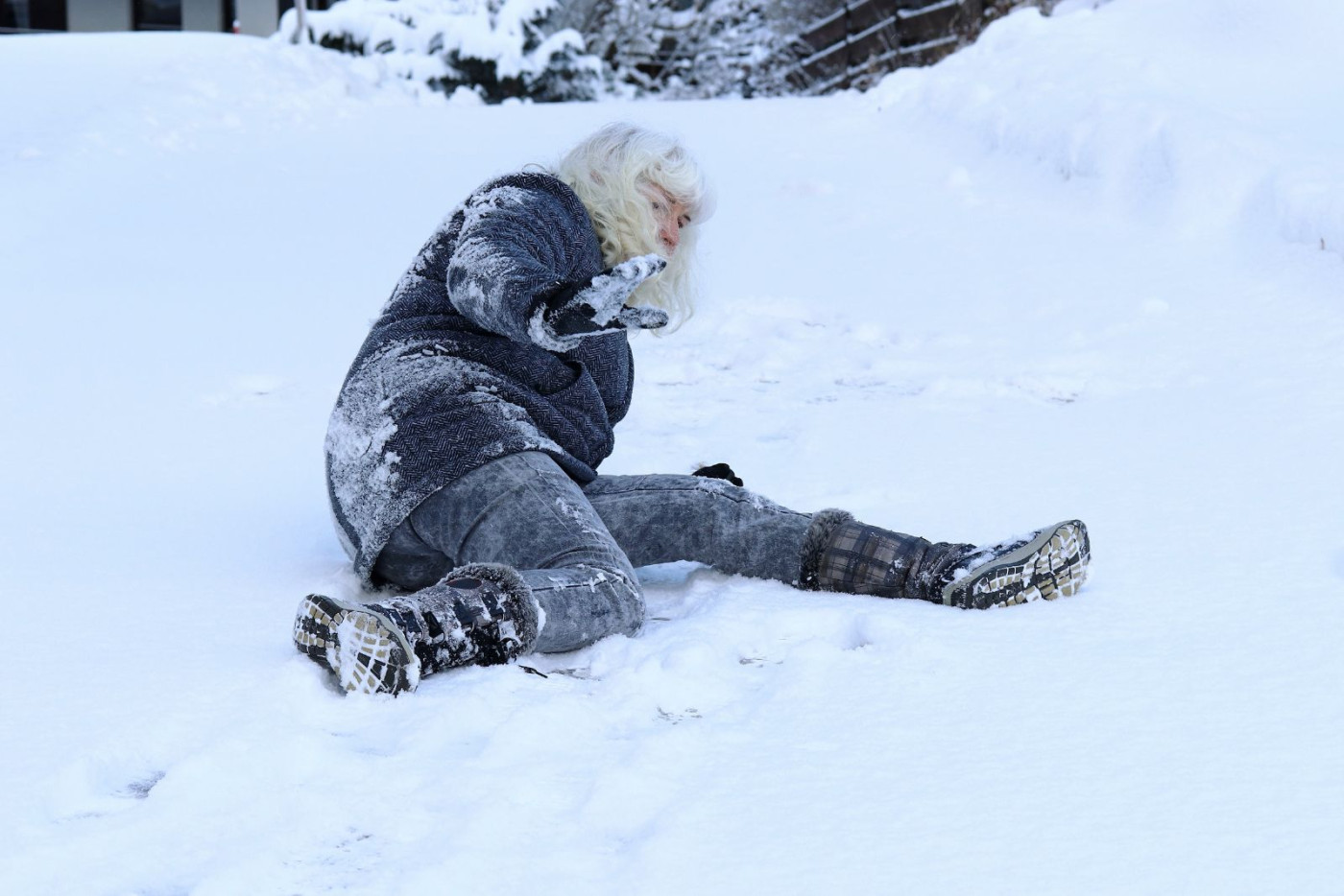 Woman falling in snow